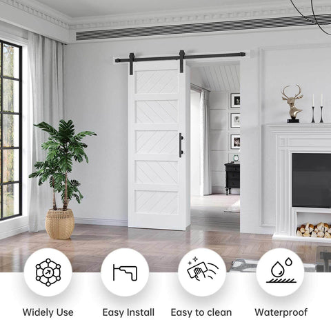White 30x84 Inch Sliding Barn Door With 5.5 Ft Hardware Kit Included Solid MDF Slab With Waterproof Scratch Resistant PVC Surface DIY Easy Install Space Saving 5 Panel Door installed in living room