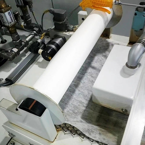Straight Up Tough Industrial Filter Paper Roll For Machine Oil Cleanup Efficiently Snags Metal Shavings And Sludge In Wastewater With Massive Dirt Capacity Coarse Grade 3 X 328 Feet installed on a machine.