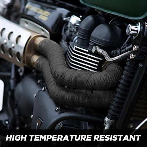 Exhaust Heat Wrap Kit 2 Inch 16 Foot High Temp Fiberglass Header Wrap installed on motorcycle engine for thermal protection