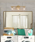 Gold Vanity Light Fixture For Bathroom With Clear Glass Shades Modern Rustic Over Mirror Sconce in laundry room setting