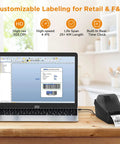 Direct Thermal Label Printer 2 Inch Wide For Barcode Stickers And QR Codes connected to a MacBook on wooden table.