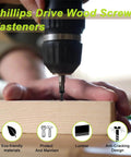 Wood Screws Assortment Kit With 500 Phillips Drive Black Flat Head Screws in use with a drill on a wooden board