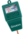 Close-up of green Plastic Soil Moisture Meter For Plants Indoor And Outdoor Hygrometer Moisture Sensor Plant Water Meter with dial gauge.