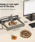 Dope 10W Desktop Laser Engraver Kit With Preassembled Frame, showing engraver, wooden cuts, computer, ideal for DIY projects.