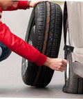 Person using Replacement Car Wheel Bolt For Spare Tire Hold Down Durable Steel Construction Easy Installation Sturdy Material.