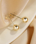 Unisex 14K Gold Ball Stud Earrings Lightweight Hypoallergenic Lead Free Nickel Free 16.9mm By 6mm 1g Durable Everyday Wear Jewelry For Women And Men, pair on satin