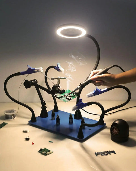 Magnetic Third Hand Soldering Station With 3X To 6X Magnifying Glass, LED Lighting, Adjustable Alligator Clips, Heavy Duty Base in use