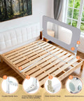Swing Down Bed Rail Guard For Toddlers 59 Inch Long showing reinforced alloy steel frame and extra wide base on wooden bed frame