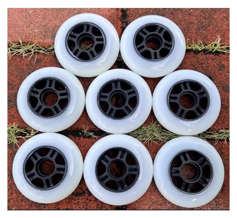 Inline Skate Wheels Replacement Set With Durable Bearings For Roller Skating Indoors And Outdoors Delivers Smooth Stable Rides At High Speeds Reduces Friction For Quick Acceleration Easy Install For Most Skates, 8-pack on red pavement