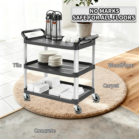 Front view of a rolling utility cart with three gray shelves and four caster wheels
