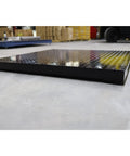 Built Different Digital Industrial Floor Scale Rock Solid Alloy Steel Platform 48 By 48 Inches for warehouse use, side view.