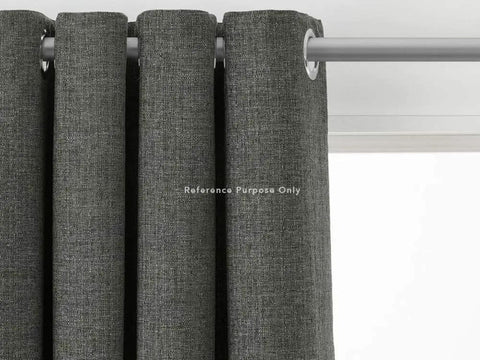 Close-up of dark gray curtains with metallic grommets on a rod, illustrating use for 1.5 Inch Grommet Tool Kit for Curtains and Drapes for DIYers with Setter, Hole Punch Cutter, Block Anvil and 10 Heavy Duty Grommets Ideal for Tents Tarps Textiles and More