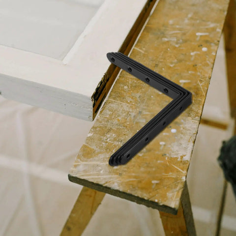 Heavy Duty Stainless Steel Straight Brackets Set Of 4 For Furniture Repair And Reinforcement on a wooden surface.