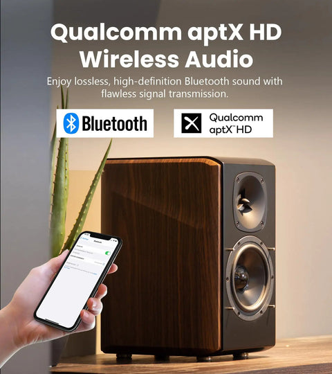 Person connecting phone via Bluetooth to S2000MKIII High Fidelity Studio Monitor Speakers with Coaxial Tweeter, shown in walnut finish.