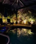 Low Voltage Landscape Lighting 20W Outdoor Spotlight Floodlight for Driveways and Gardens illuminating poolside at night