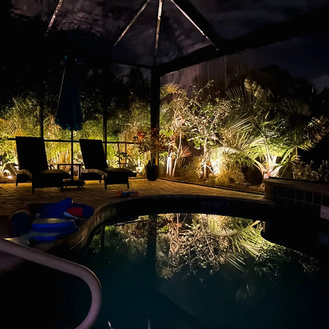 Low Voltage Landscape Lighting 20W Outdoor Spotlight Floodlight for Driveways and Gardens illuminating poolside at night