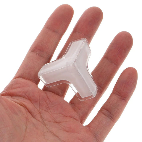 Person holding a Clear PVC Furniture Corner Guard from Set Of 20 Soft Edge Protectors for Wardrobes Windows Desks and Tables
