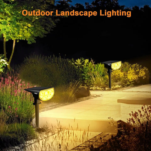 Outdoor Solar Spotlights 650 Lumen IP67 Waterproof Warm White 3000K illuminating garden walkway at night, 6 pack visible