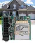 Close-up of Two Channel WiFi Door Opener Module with remote phone control, shown in front of a house.