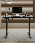 Rock Solid 55 Inch Electric Standing Desk With Double Beam Frame For Home Office Or Gaming Setup with sleek black finish.
