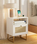 Rattan Boho Nightstand With Charging Station Dope Space Saving Farmhouse Wood Bedside Table With Storage Drawer And Open Shelf Gold Frame End Table For Bedroom Living Room Office White next to a bed with a lamp and phone on top