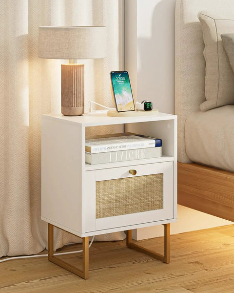 Rattan Boho Nightstand With Charging Station Dope Space Saving Farmhouse Wood Bedside Table With Storage Drawer And Open Shelf Gold Frame End Table For Bedroom Living Room Office White next to a bed with a lamp and phone on top