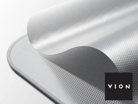 Close-up of Tesla Model Y Roof Sunshade Full Blackout With Graphene Enhanced UV Coating And Silver Reflective Layer, dual-layer fabric in gray.