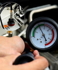 No Sweat Radiator Pressure Tester Kit Featuring 18 Premium Adapters And Rock Solid Hand Pump shows pressure gauge in use.