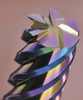 Close-up of DLC-coated carbide end mill showing six flutes and sharp cutting edge for aluminum and copper milling
