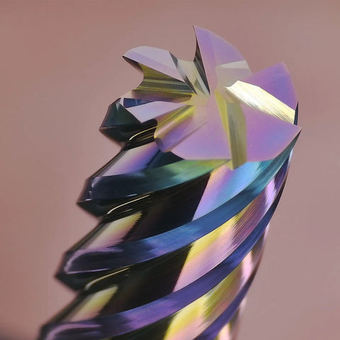 Close-up of DLC-coated carbide end mill showing six flutes and sharp cutting edge for aluminum and copper milling