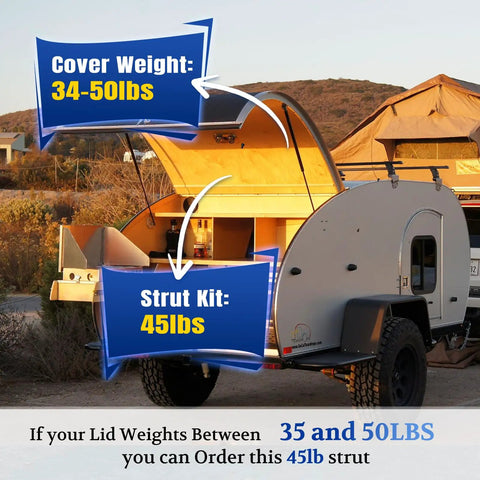 Trailer with open fiberglass cover supported by 27 Inch 45lb Gas Strut For Fiberglass Tonneau Cover And Pickup Truck Bed Topper Undercover Replacement Part Easy Install Compatible With IH1214GS SL2645 ST270EDI45 ST270P45EZ10 190725 next to a mountain view.