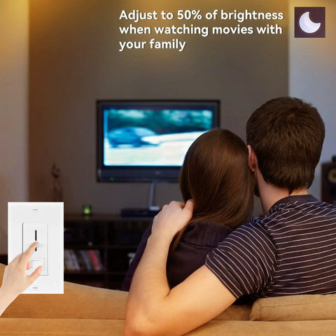 Couple watching TV on sofa with dimmer switch adjusting light brightness