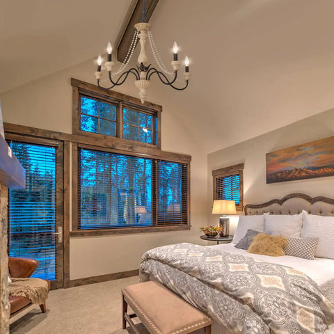 Five-Light French Country Rustic Chandelier With Glass Bead Chains, White Distressed Wood Finish in cozy bedroom setting