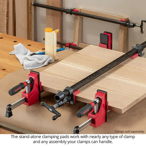 Heavy Duty Woodworking Clamp Pads 12 Pack Shield Boards From Nasty Glue Residue And Dent Marks Universal Fit on bar clamps in workshop.