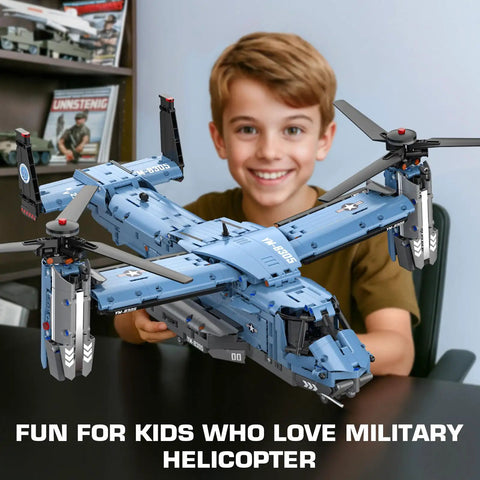 Child holding V22 Osprey Military Helicopter Building Blocks Set With 1486 Pieces For Adults And Kids Ages 8 10 12 14