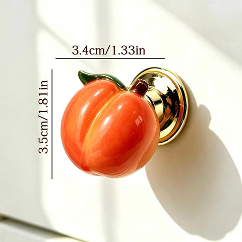 Adorable 3D Peach Cabinet Knobs And Drawer Pulls For A Fresh Playful Home Vibe And Cherry Picked Realistic Fruit Handle set on gold base.