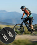 Cyclist riding with 2 Pcs Bike Pedal Straps With Toe Clips, Universal Replacement Foot Pedal Straps in focus