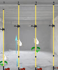 Pro Grade Multifunction Laser Level Pole with adjustable height and 360 degree rotating head in various setup stages.