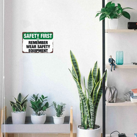 Funny Aluminum Safety Sign Wear Your Gear 8x12 Inch Wall Decor in room with potted plants and shelf