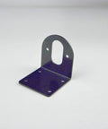 CHANCS motor mounting bracket, blue metal base with 4 holes and vertical plate with oval slot for 555–540 motors.