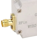 Close-up of Low Noise RF Amplifier 10 MHz To 6 GHz 20 DB LNA With High Flatness SMA female input in aluminum alloy housing.