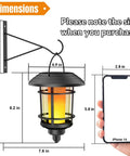 4 Pack Solar Powered Flame Wall Lanterns Outdoor Waterproof Sconce Lights Flickering Led Candles Auto On Off Solid Build Zero Wiring Hassle Slick Backyard Glow Up dimensions next to an iPhone 14 for size reference.