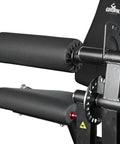 Close-up of Plate Loaded Leg Extension And Curl Machine for Home Gym showing padded rollers and adjustable steel frame