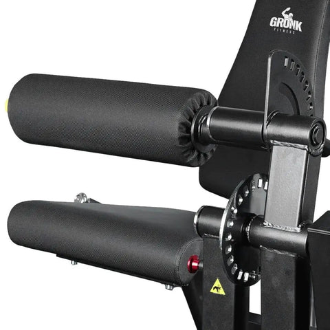 Close-up of Plate Loaded Leg Extension And Curl Machine for Home Gym showing padded rollers and adjustable steel frame