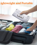 Person packing Cruise Essentials Hanging Shower Caddy With 7 Pockets And Quick Dry Mesh Portable Bathroom Organizer in suitcase