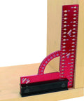 Pro Grade 6 Inch By 4 Inch Aluminum Framing Square With Removable Fence for woodworking placed on wood corner