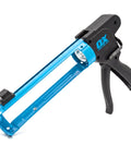 Compact 10 Oz Rodless Caulk Gun For Tight Spaces With 7 To 1 Thrust Ratio And Belt Clip, black and blue design, angled view.