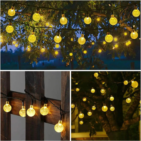 Solar String Lights Outdoor Waterproof 56ft 100 LED Globe Lights With 8 Modes Auto On Off Warm White on trees and fence