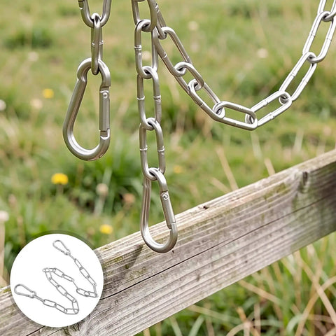 Stainless Steel Gate Chain Latch with Dual Carabiners for Fences hanging from a wooden fence in a grassy area.