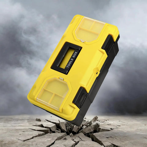 16 Inch Plastic Toolbox With Handle Portable Toolbox With Removable Tray And Lockable Design Built Tough For Home Workshop Or Garage With Small Parts Box In Black And Yellow on cracked concrete surface.
